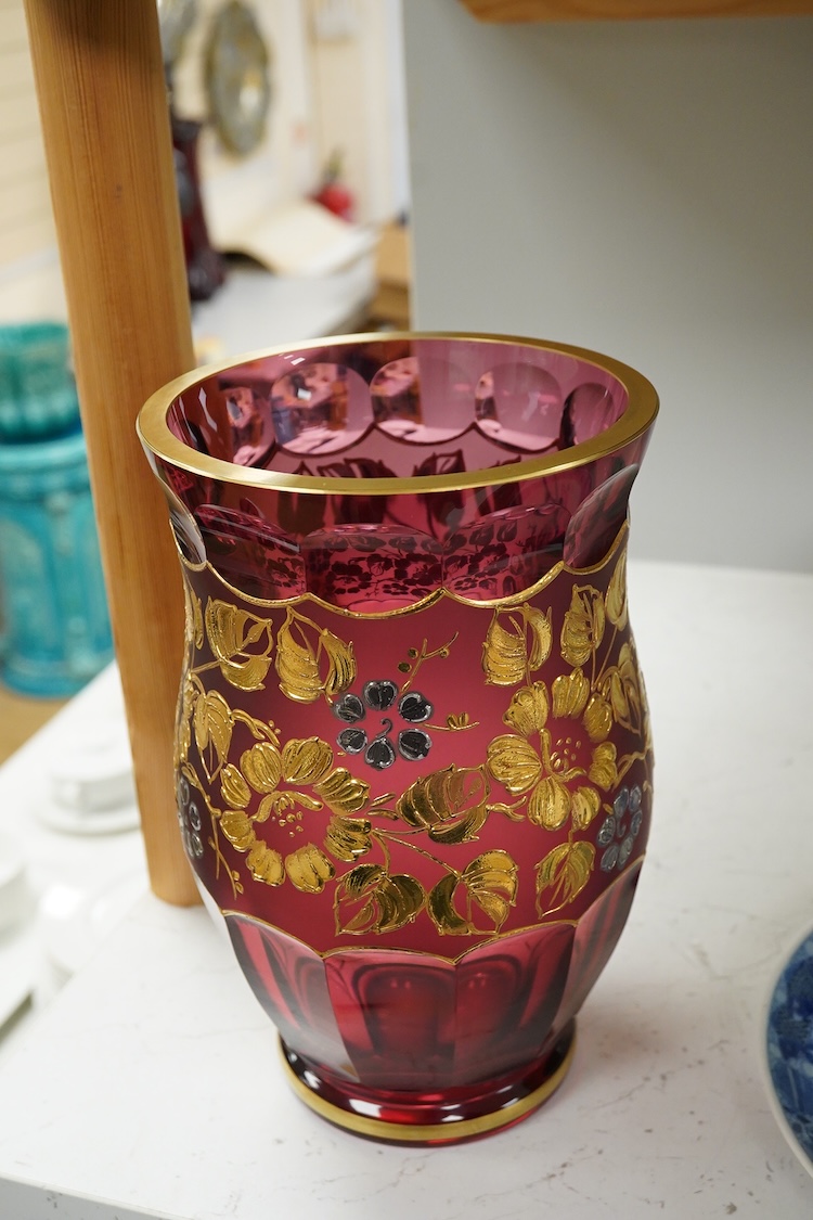 A Bohemian Czech gilded amethyst glass vase, 23cm high